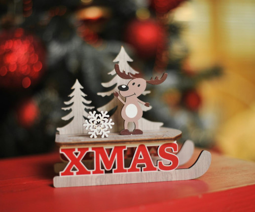 Decor in stilul sărbătorilor de iarna Ren pe sanie